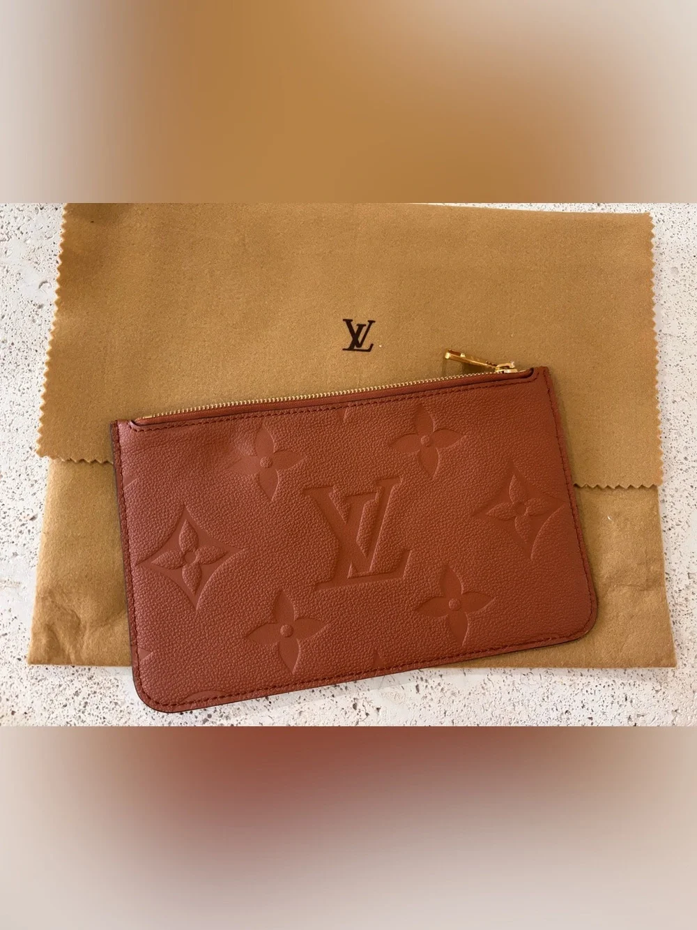 Authentic Louis Vuitton Neverfull Empreinte GM cognac pouch wristlet